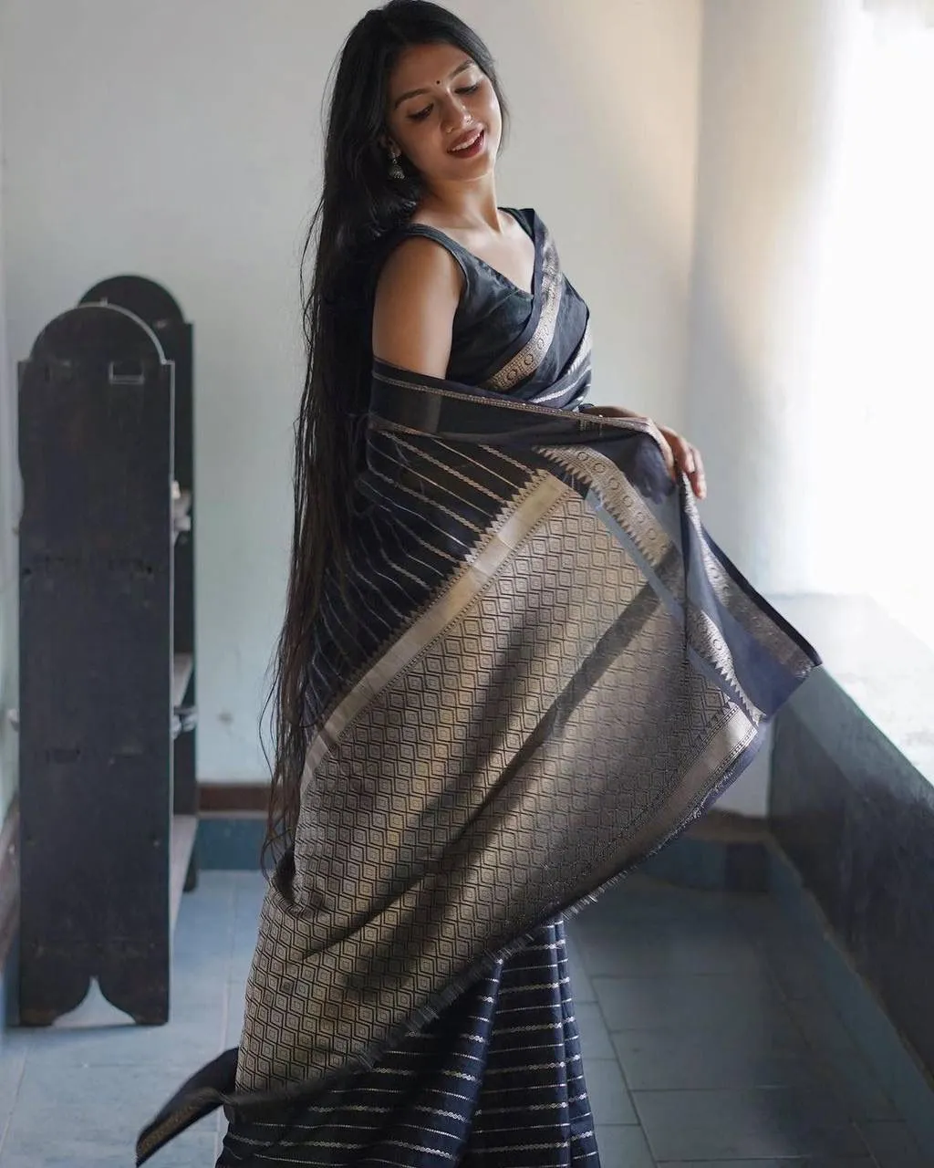 Trendy Black Soft Silk Saree With Precious Blouse Piece